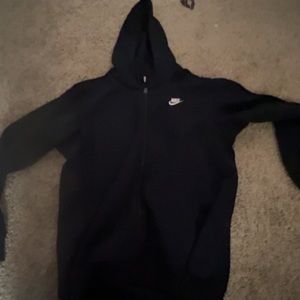 A very dark navy zip up